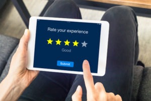 user rates their customer experience with online review
