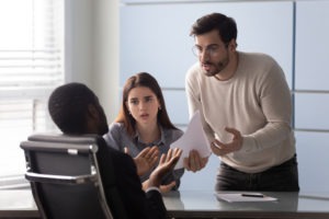 A young couple dissatisfied with their financing contract