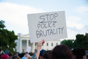 a police brutality protest sign