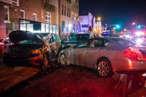 cars in an accident at night