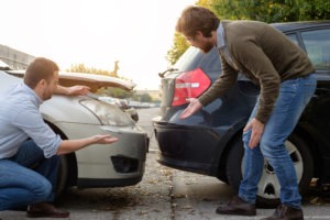 two men arguing over accident