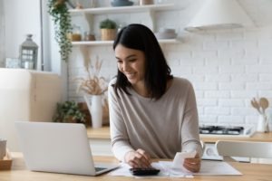 young-woman-happy-to-see-her-settlement-came-in