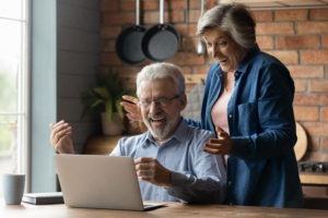 happy couple seeing their funding went through