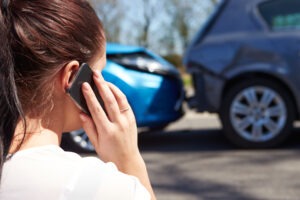 woman-calling-for-help-after-car-crash