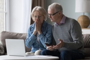 elderly couple shocked to see a personal injury bill on their computer